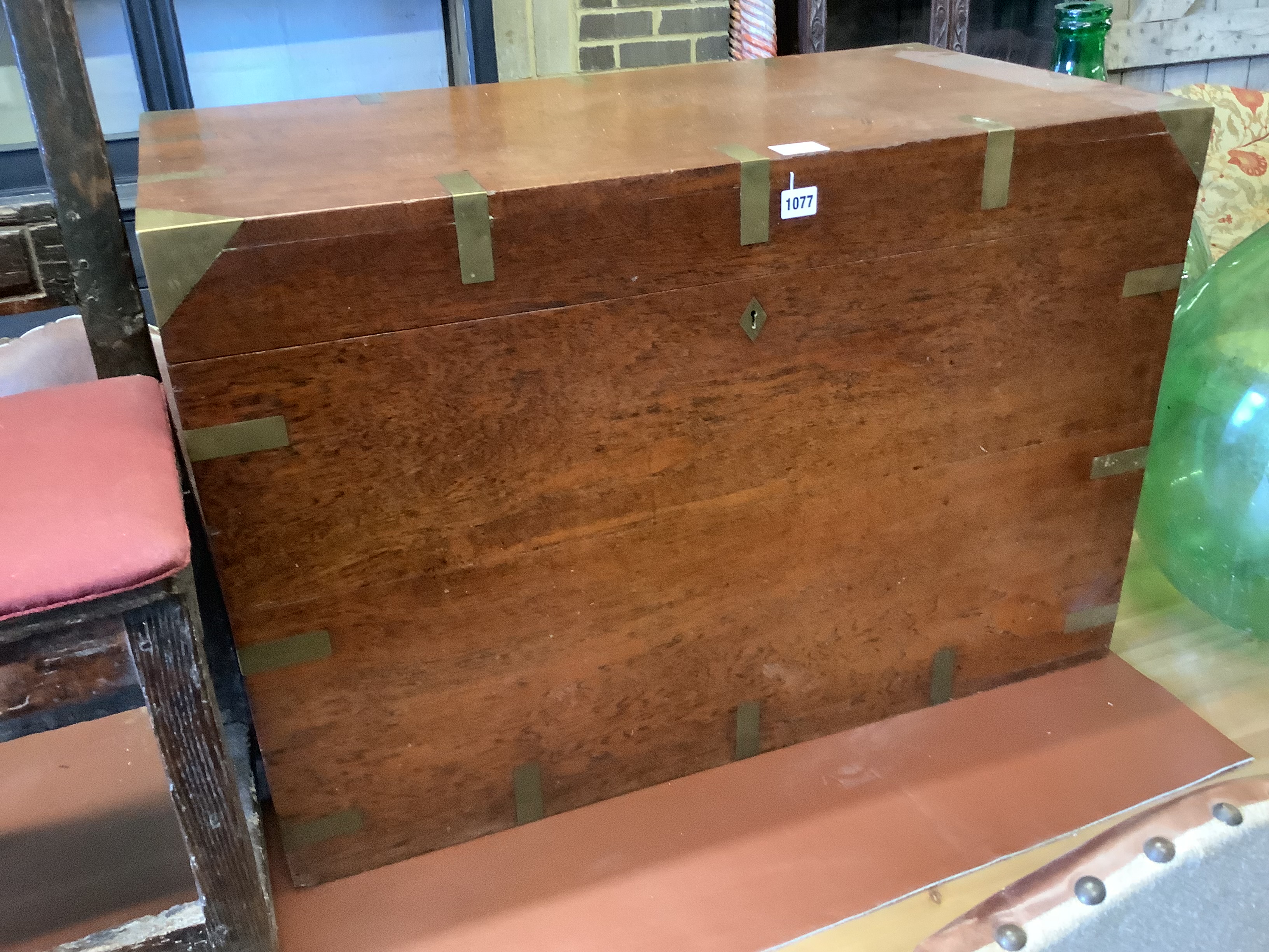 A Victorian brass bound teak chest